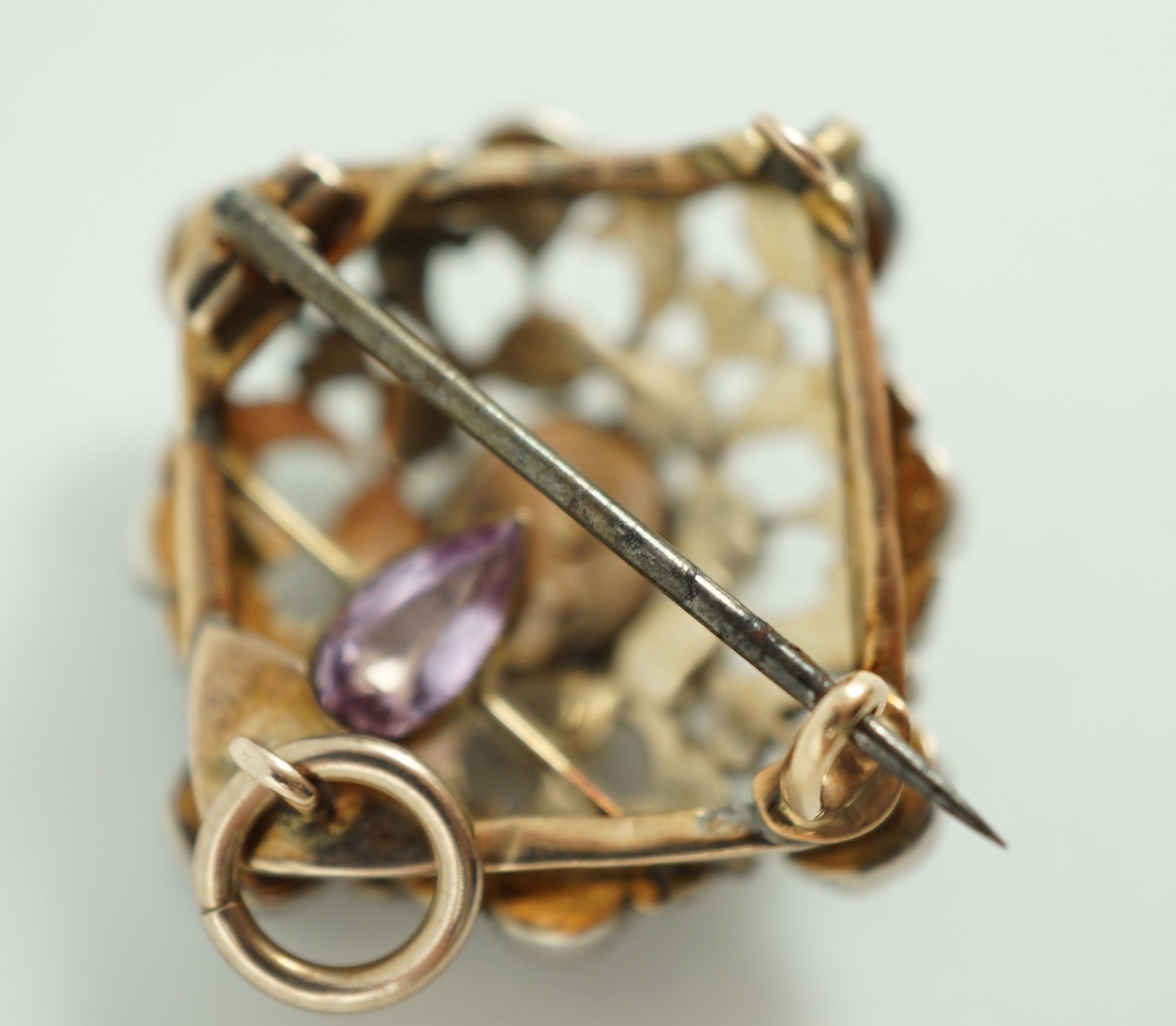 A Victorian pierced gold, silver and rose cut diamond set pendant brooch